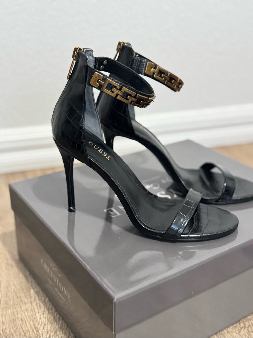 GUESS Black Croc-Embossed Ankle-Strap Stiletto Sandals with Gold Chain Detail
